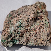 Disseminated malachite in Quartz Monzonite